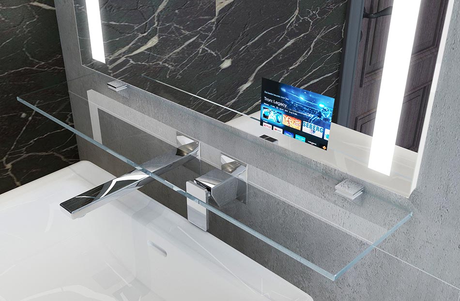 L'étagère en verre est un accessoire intemporel qui s'accorde parfaitement avec le miroir et permet aussi de ranger les accessoires de salle de bains